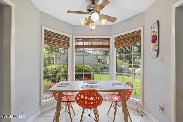 5348 Saratoga Dr, Jackson, MS 39211 - dining area featuring light tile patterned flooring, healthy amount of natural light, and baseboards