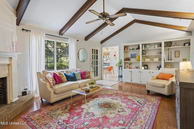 5348 Saratoga Dr, Jackson, MS 39211 - living room with a ceiling fan, wood finished floors, and a brick fireplace