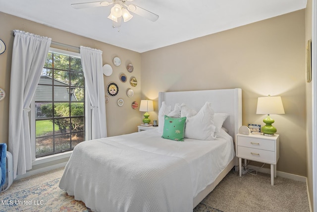 5348 Saratoga Dr, Jackson, MS 39211 - bedroom featuring light carpet, baseboards, and ceiling fan
