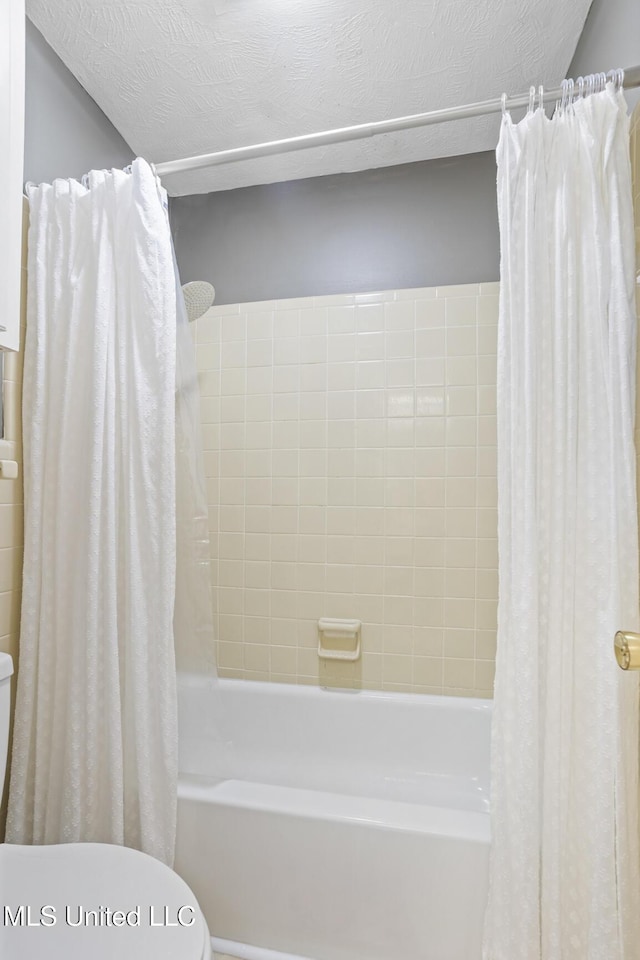 5348 Saratoga Dr, Jackson, MS 39211 - bathroom featuring toilet and shower / tub combo with curtain