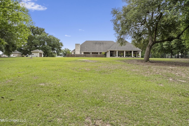 view of yard with fence