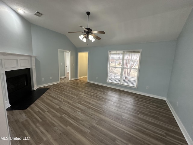 unfurnished living room featuring vaulted ceiling, ceiling fan, and dark hardwood / wood-style flooring