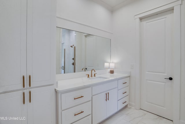 bathroom with vanity and an enclosed shower