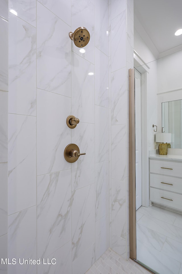 bathroom with a tile shower