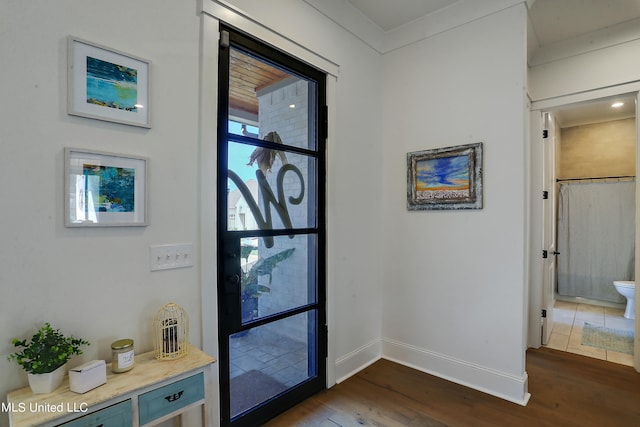 foyer entrance with dark hardwood / wood-style flooring