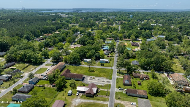 aerial view featuring a wooded view
