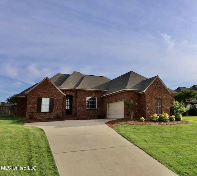 view of front of home featuring concrete driveway, brick siding, and a front lawn