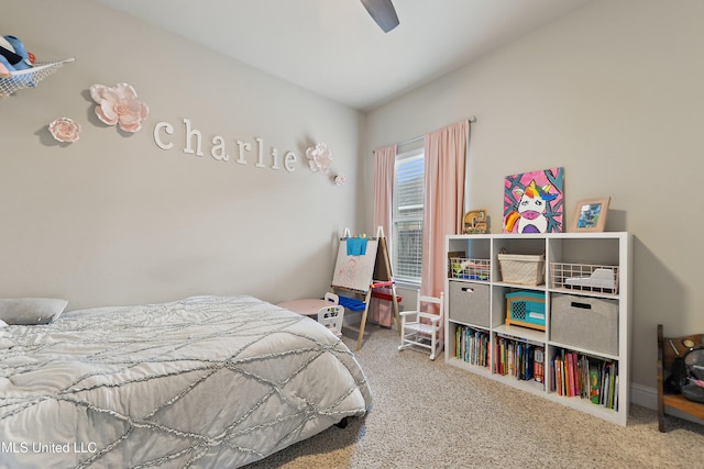 carpeted bedroom with ceiling fan