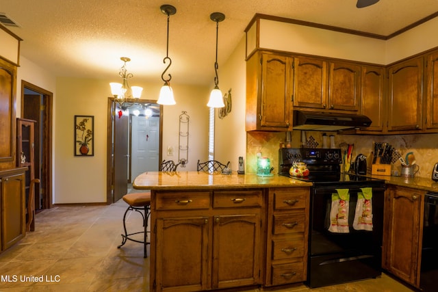 kitchen featuring black / electric stove, decorative light fixtures, decorative backsplash, and a textured ceiling