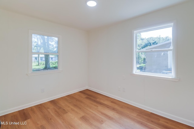 3217 Detroit Ave, Pascagoula, MS 39581 - unfurnished room featuring healthy amount of natural light, light wood-style flooring, and baseboards