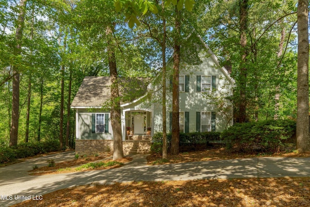 view of front of house with brick siding