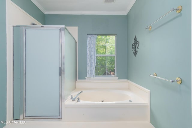 bathroom featuring a shower stall, a garden tub, crown molding, and visible vents