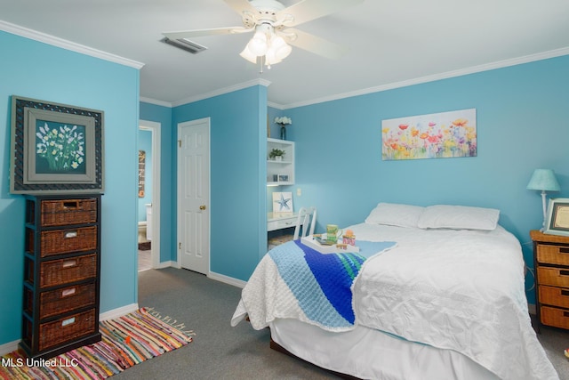 carpeted bedroom featuring baseboards, a ceiling fan, visible vents, and ornamental molding