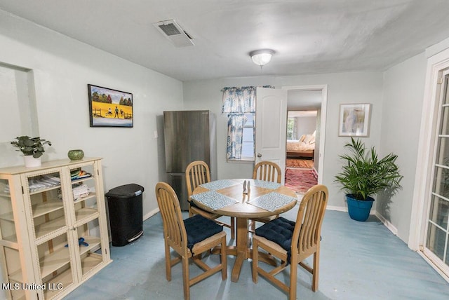 317 Ballentine St, Bay Saint Louis, MS 39520 - dining space with visible vents and baseboards