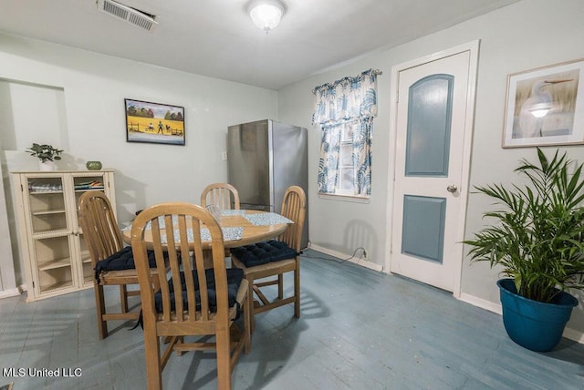 317 Ballentine St, Bay Saint Louis, MS 39520 - dining area featuring baseboards and visible vents