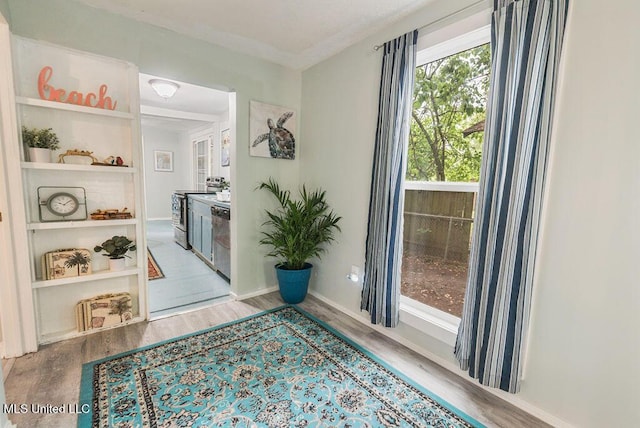 317 Ballentine St, Bay Saint Louis, MS 39520 - interior space featuring baseboards and wood finished floors