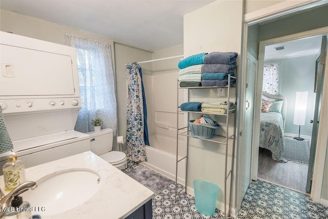 317 Ballentine St, Bay Saint Louis, MS 39520 - ensuite bathroom featuring toilet, vanity, shower / bath combo with shower curtain, ensuite bath, and visible vents