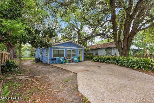 317 Ballentine St, Bay Saint Louis, MS 39520 - back of property with fence and central AC unit
