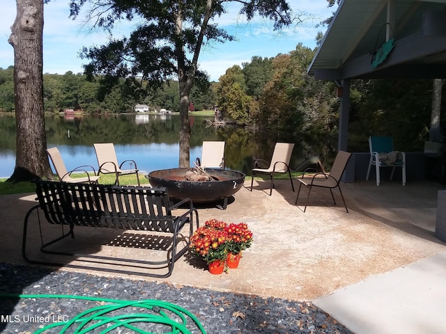 683B Cedar Hill Rd, Flora, MS 39071 - view of patio with a fire pit and a water view