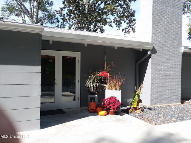 683B Cedar Hill Rd, Flora, MS 39071 - property entrance featuring french doors and a chimney