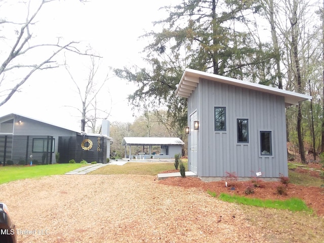 683B Cedar Hill Rd, Flora, MS 39071 - view of outdoor structure with driveway and a detached carport