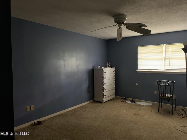 5019 Forest Hill Rd, Jackson, MS 39272 - unfurnished bedroom featuring carpet flooring, a textured ceiling, a ceiling fan, and baseboards