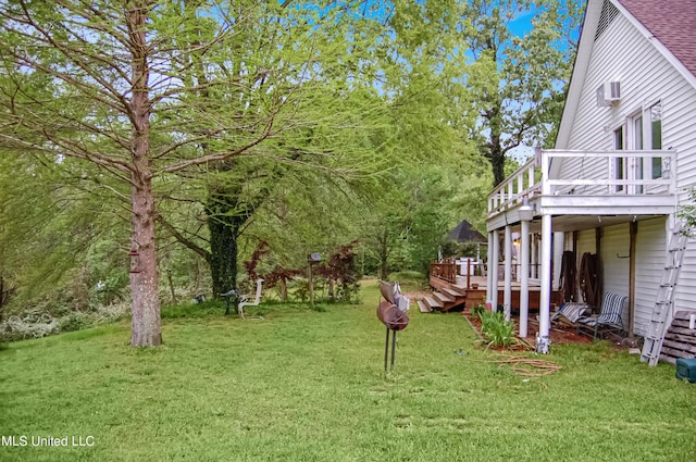 view of yard featuring a wooden deck