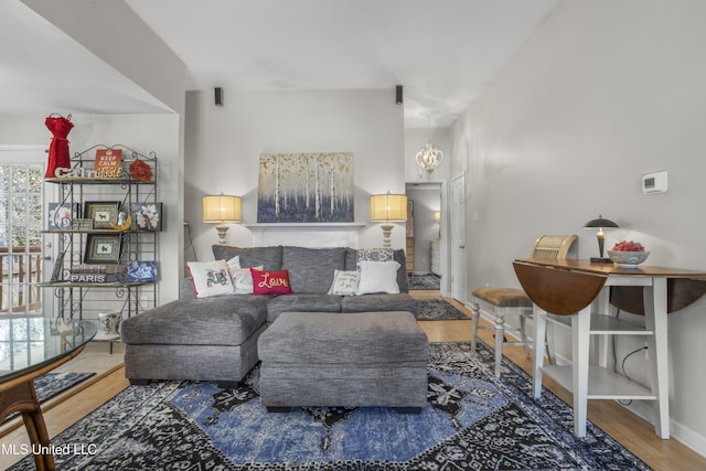 living room featuring wood finished floors and baseboards