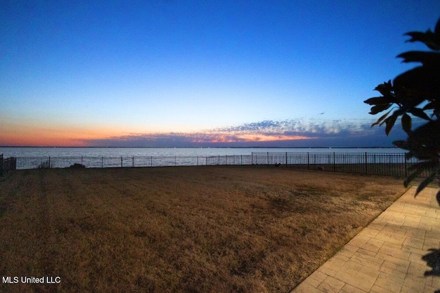 504 Port Arbor, Brandon, MS 39047 - yard at dusk featuring a water view