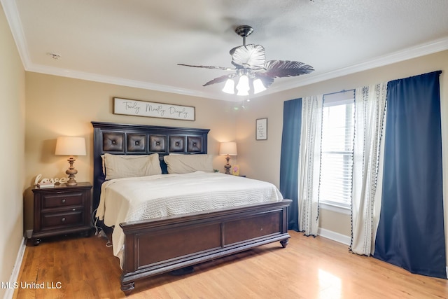 5421 Espy Ave, Long Beach, MS 39560 - bedroom with ornamental molding, wood finished floors, and ceiling fan