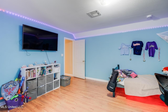 5421 Espy Ave, Long Beach, MS 39560 - bedroom with wood finished floors and baseboards
