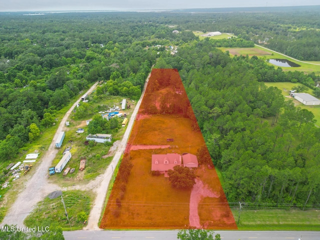 5421 Espy Ave, Long Beach, MS 39560 - bird's eye view of a forest and a nearby body of water