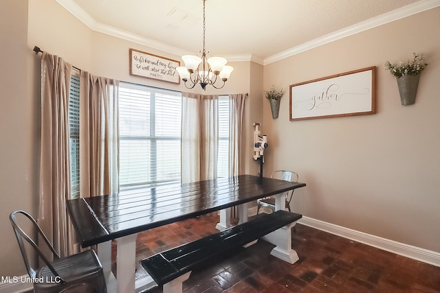 dining room featuring crown molding and a notable chandelier