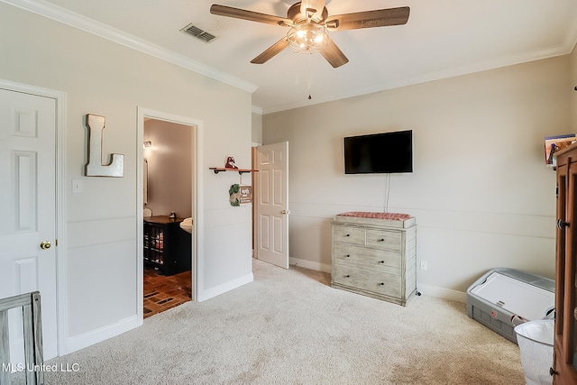 carpeted bedroom with ornamental molding and ceiling fan