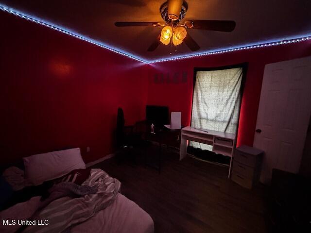 bedroom featuring hardwood / wood-style flooring