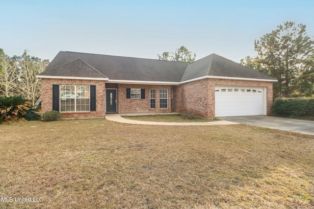 ranch-style house featuring a garage and a front lawn