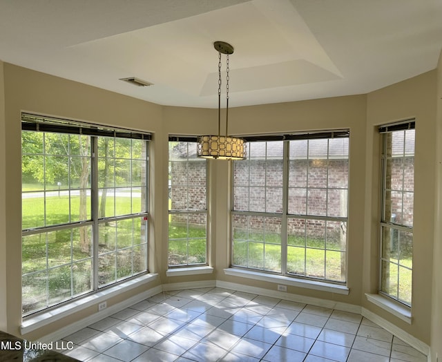 8004 Martin Bluff Rd, Gautier, MS 39553 - unfurnished dining area with baseboards and light tile patterned floors