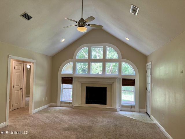 8004 Martin Bluff Rd, Gautier, MS 39553 - unfurnished living room with light colored carpet, a ceiling fan, healthy amount of natural light, and lofted ceiling