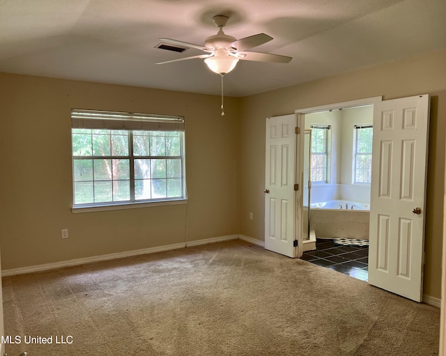 8004 Martin Bluff Rd, Gautier, MS 39553 - carpeted empty room featuring ceiling fan and baseboards