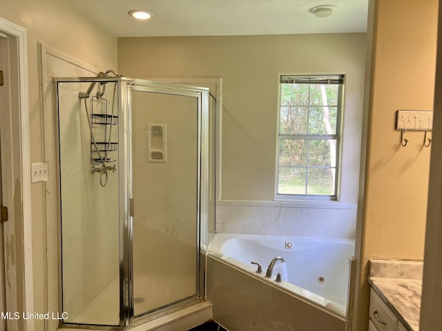 8004 Martin Bluff Rd, Gautier, MS 39553 - full bathroom featuring a stall shower, vanity, and a whirlpool tub