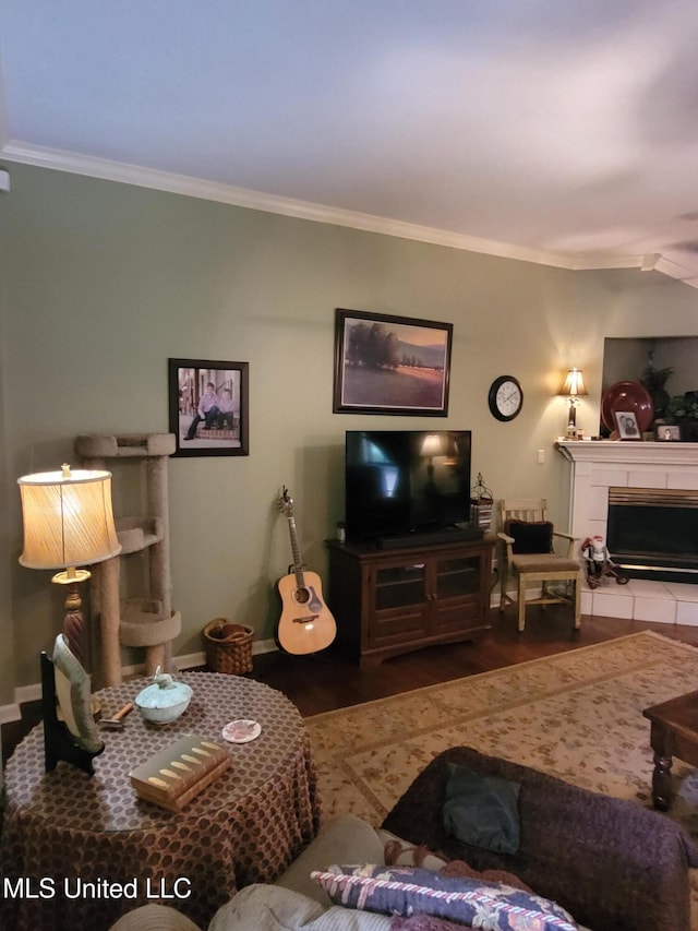 8475 Windersgate Dr, Olive Branch, MS 38654 - living area featuring crown molding, wood finished floors, baseboards, and a fireplace