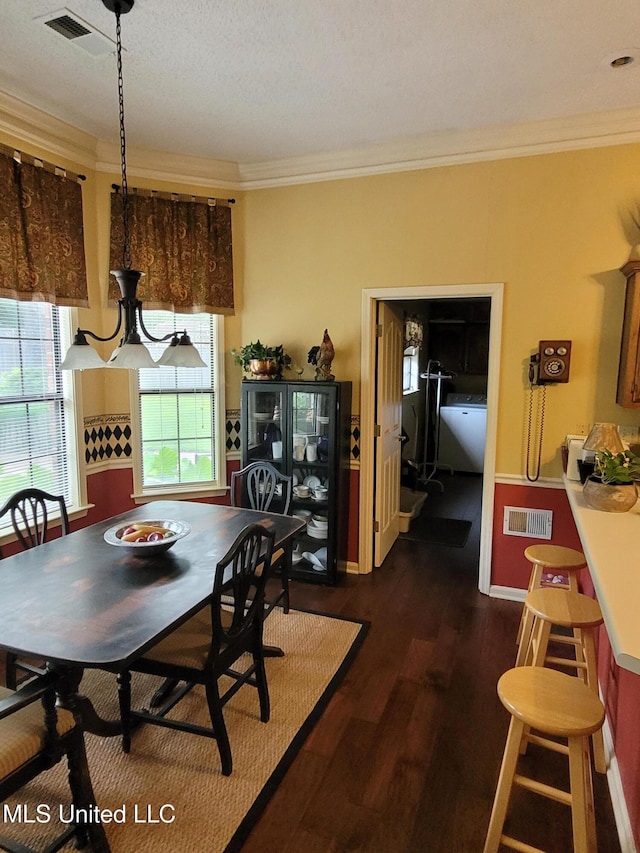 8475 Windersgate Dr, Olive Branch, MS 38654 - dining space featuring crown molding, dark wood-style floors, and baseboards