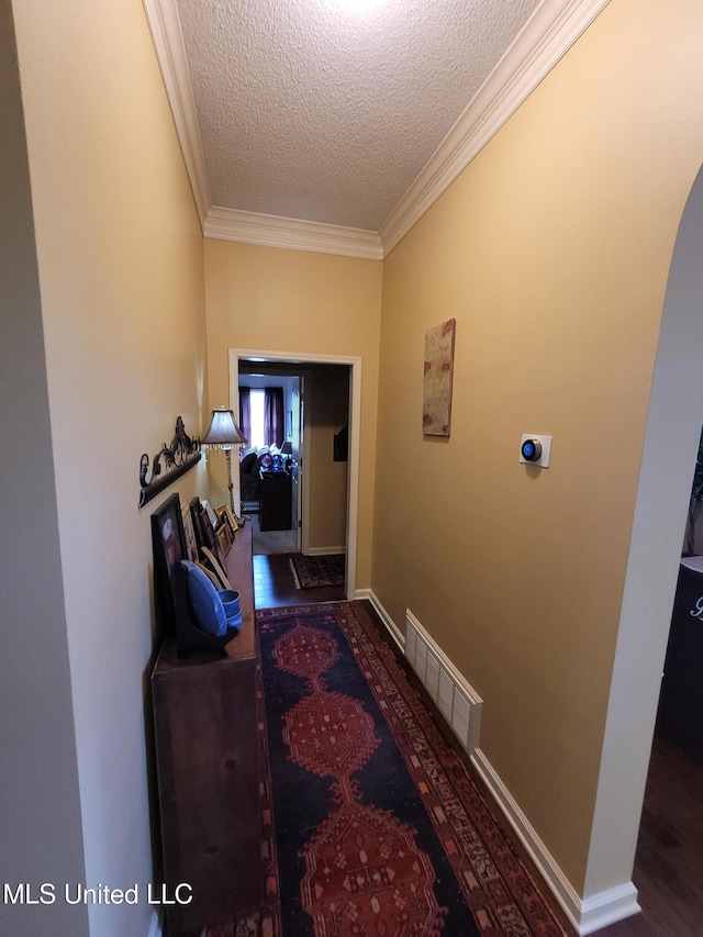 8475 Windersgate Dr, Olive Branch, MS 38654 - corridor with a textured ceiling, ornamental molding, and baseboards