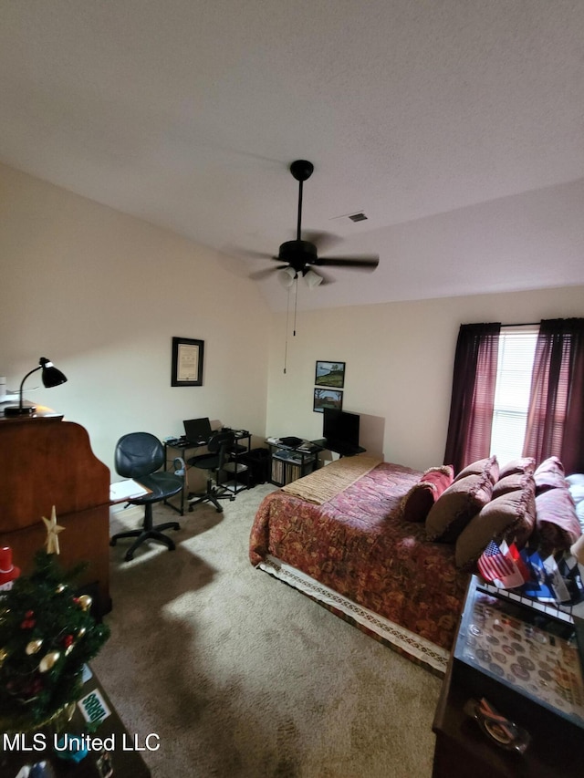 8475 Windersgate Dr, Olive Branch, MS 38654 - carpeted bedroom with a desk and ceiling fan