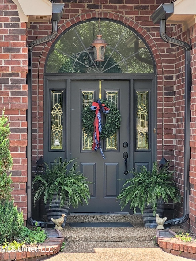 8475 Windersgate Dr, Olive Branch, MS 38654 - property entrance with brick siding