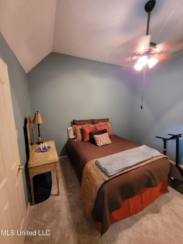 8475 Windersgate Dr, Olive Branch, MS 38654 - carpeted bedroom featuring vaulted ceiling and ceiling fan