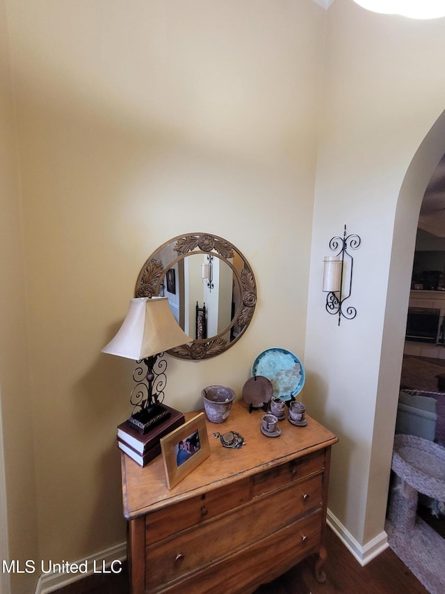 8475 Windersgate Dr, Olive Branch, MS 38654 - detailed view of arched walkways, wood finished floors, and baseboards