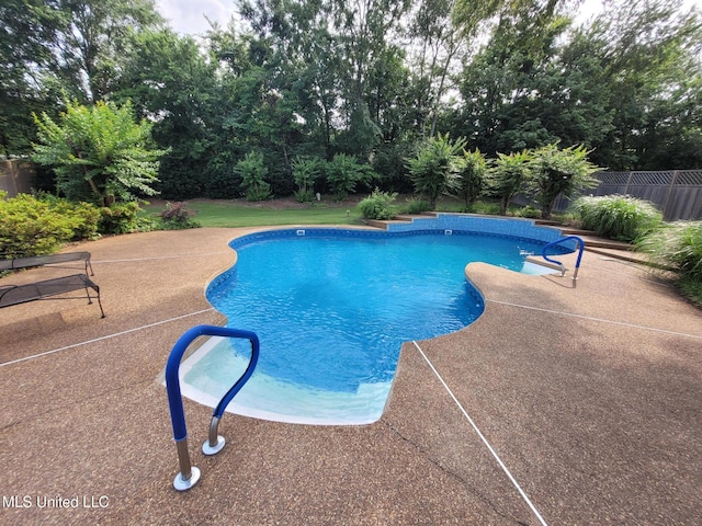 8475 Windersgate Dr, Olive Branch, MS 38654 - view of pool featuring a patio area and view of scattered trees