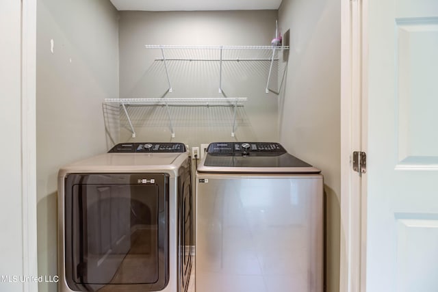 laundry room featuring independent washer and dryer