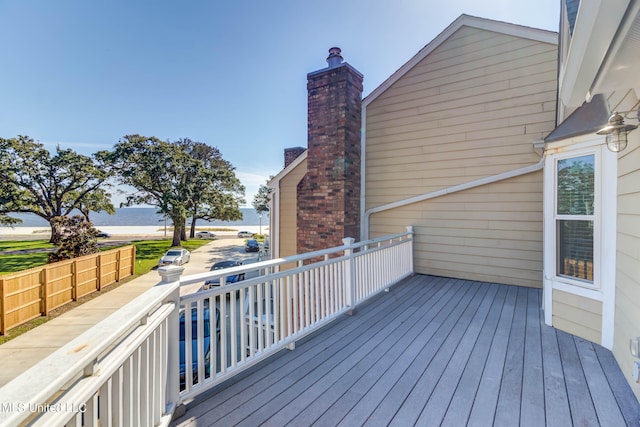 deck featuring a water view